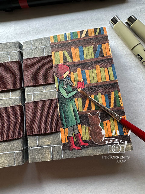 Girl And Her Cat in the library handmade book @ InkTorrents by Soma Acharya, Ink Torrents Graphics, inktorrents.com